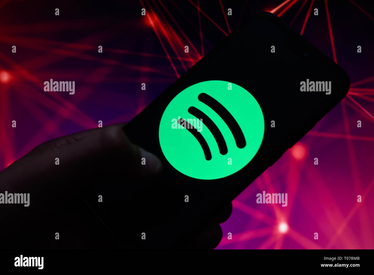 Spotify logo is seen on an android mobile phone. Stock Photo