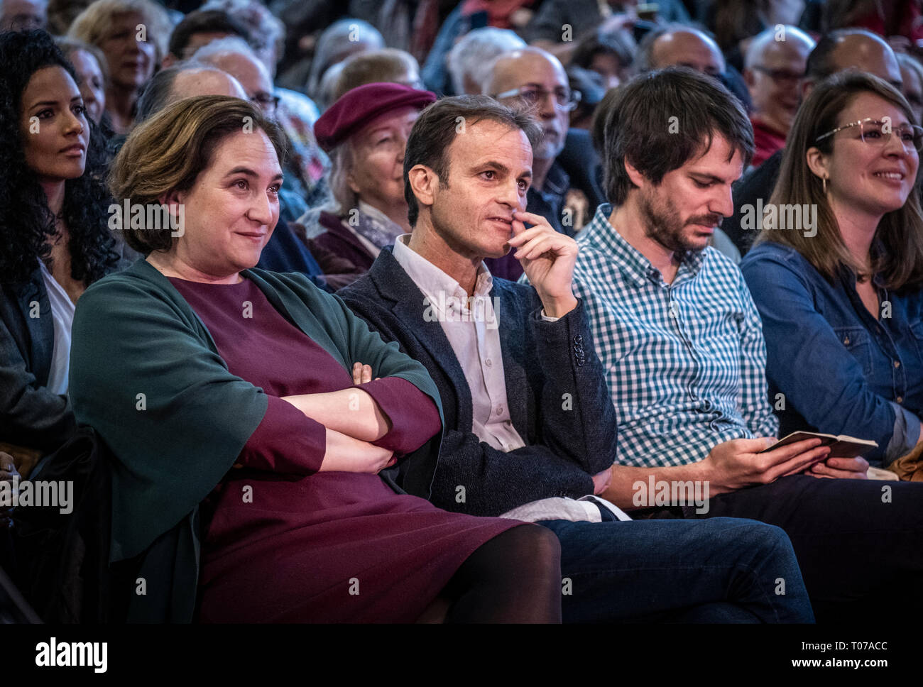 (L-R) Ada Colau, Jaume Asens, Ernest Urtasum and Janet Sanz are seen in the front row during the event. More than a thousand people have filled the centre of Les Cotxeres in the popular neighbourhood of Sant to support the electoral campaign of Barcelona in Comú of which the mayor Ada Colau is head of the list. Stock Photo