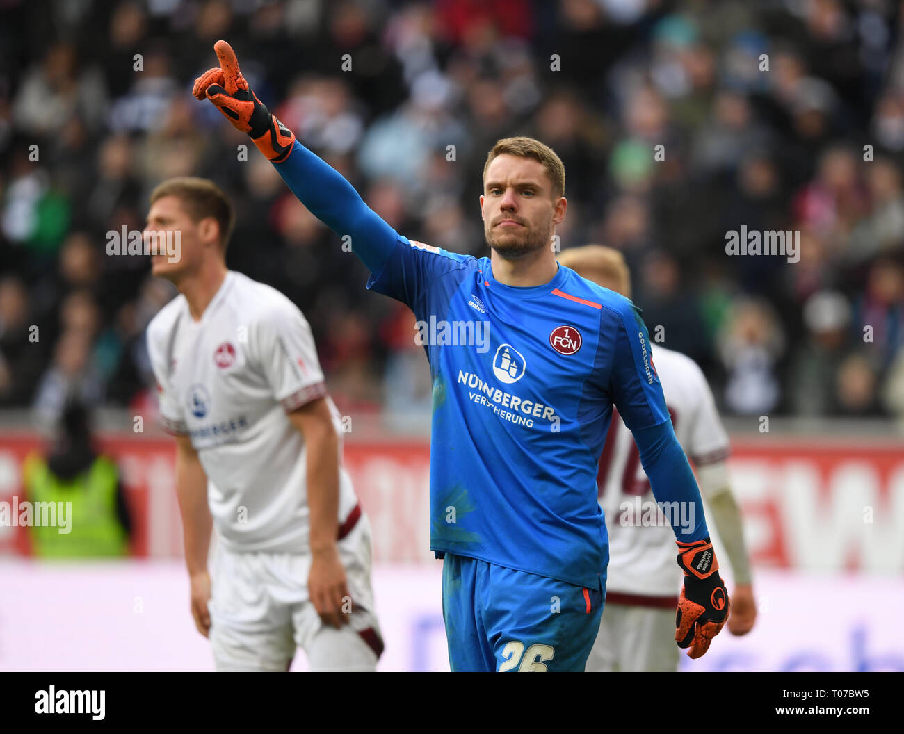 17 March 2019, Hessen, Frankfurt/Main: Soccer: Bundesliga, Eintracht Frankfurt - 1st FC Nuremberg, 26th matchday in the Commerzbank Arena. Nuremberg goalkeeper Christian Mathenia in action. Photo: Arne Dedert/dpa - IMPORTANT NOTE: In accordance with the requirements of the DFL Deutsche Fußball Liga or the DFB Deutscher Fußball-Bund, it is prohibited to use or have used photographs taken in the stadium and/or the match in the form of sequence images and/or video-like photo sequences. Stock Photo