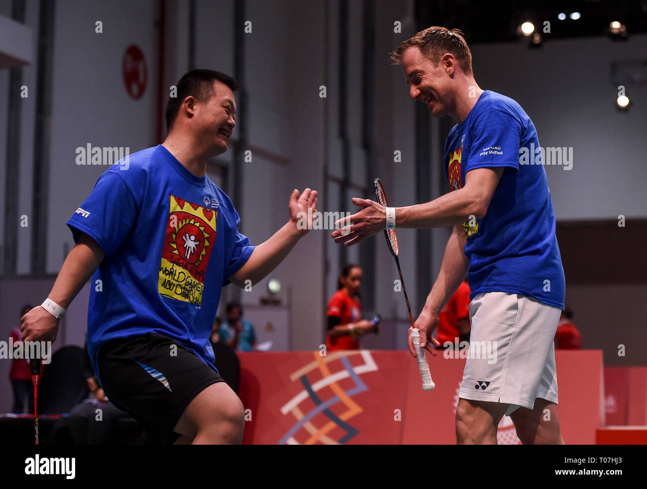 Abu Dhabi, United Arab Emirates. 18th Mar, 2019. Peter Gade of Denmark (R)  encourages Chai Xinyu from Chinese Special Olympics delegation during the  unified badminton experience event at the 2019 Abu Dhabi