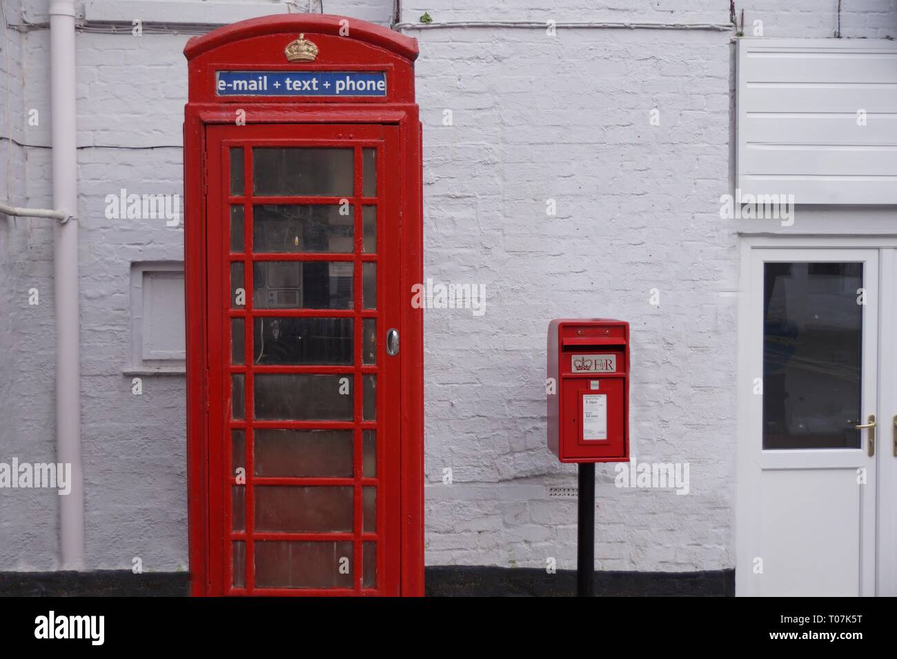 Converted telephone booths Cornwall UK Stock Photo Alamy