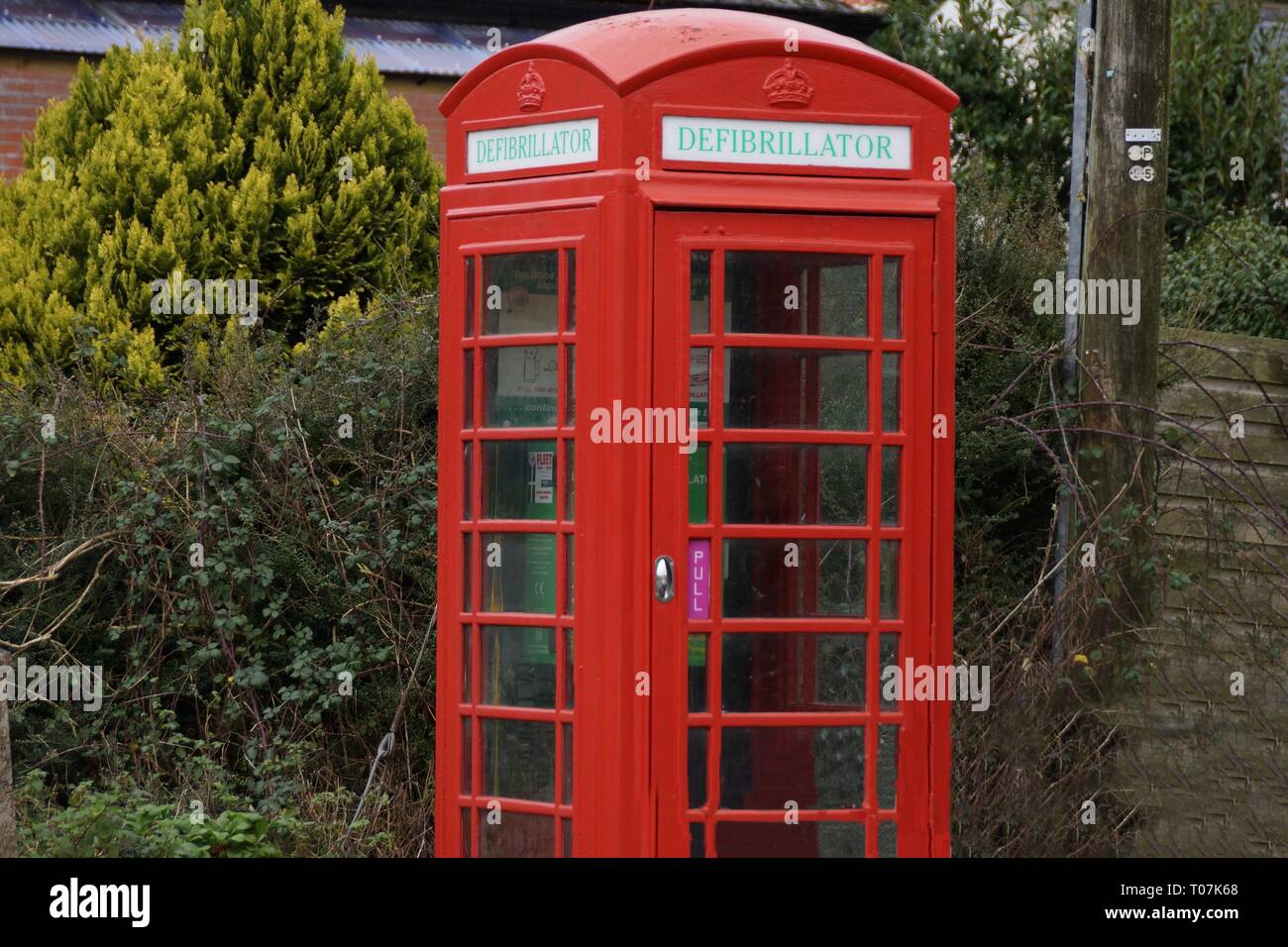 Converted telephone booths Cornwall UK Stock Photo
