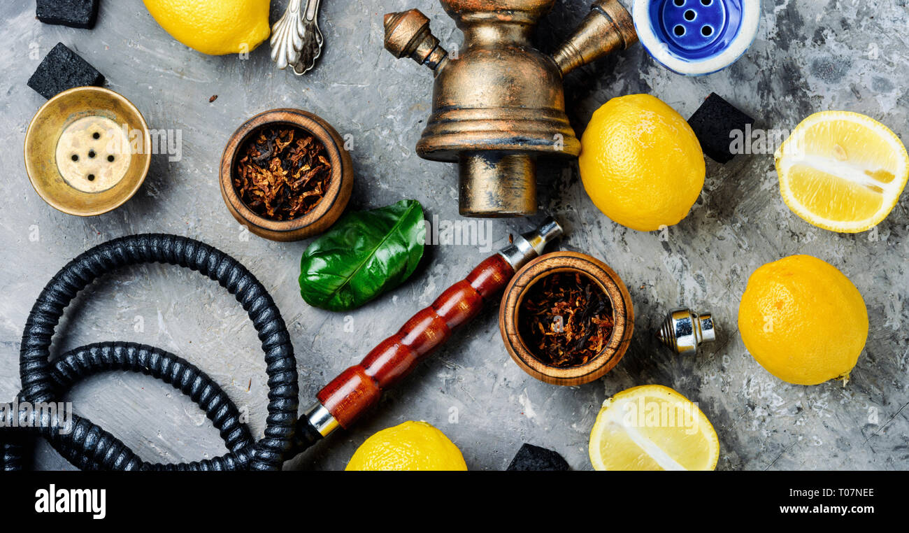 Hookah with fruit aroma for relax.Shisha hookah.Hookah with lemon.Lime ...