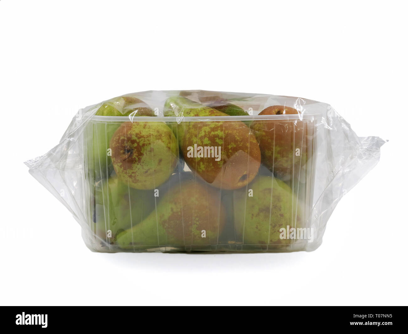 Pears wrapped with foil in plastic container isolated on white background Stock Photo