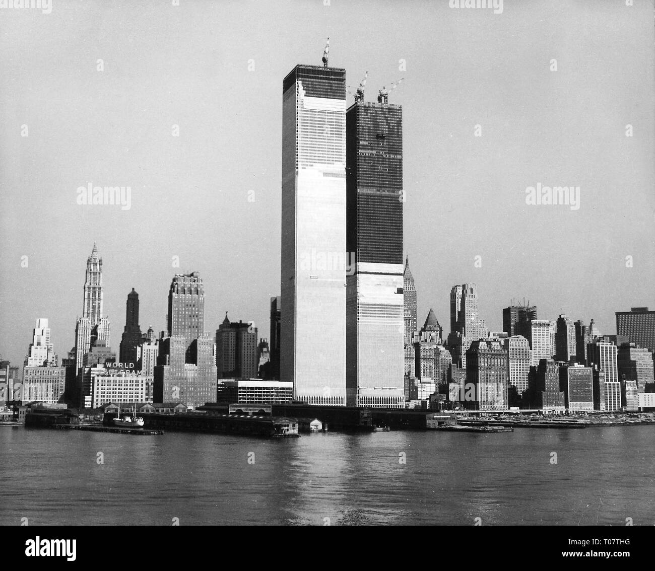 geography / travel, USA, New York, buildings, World Trade Center, built: 1966 - 1973, design by Minoru Yamasaki, both Twin Tower, exterior view, view from Hudson River, circa 1970, historic, historical, 20th century, North America, skyline, Manhattan, WTC, city view, building, under construction, construction site, skyscraper, architecture, 1970s, Additional-Rights-Clearance-Info-Not-Available Stock Photo