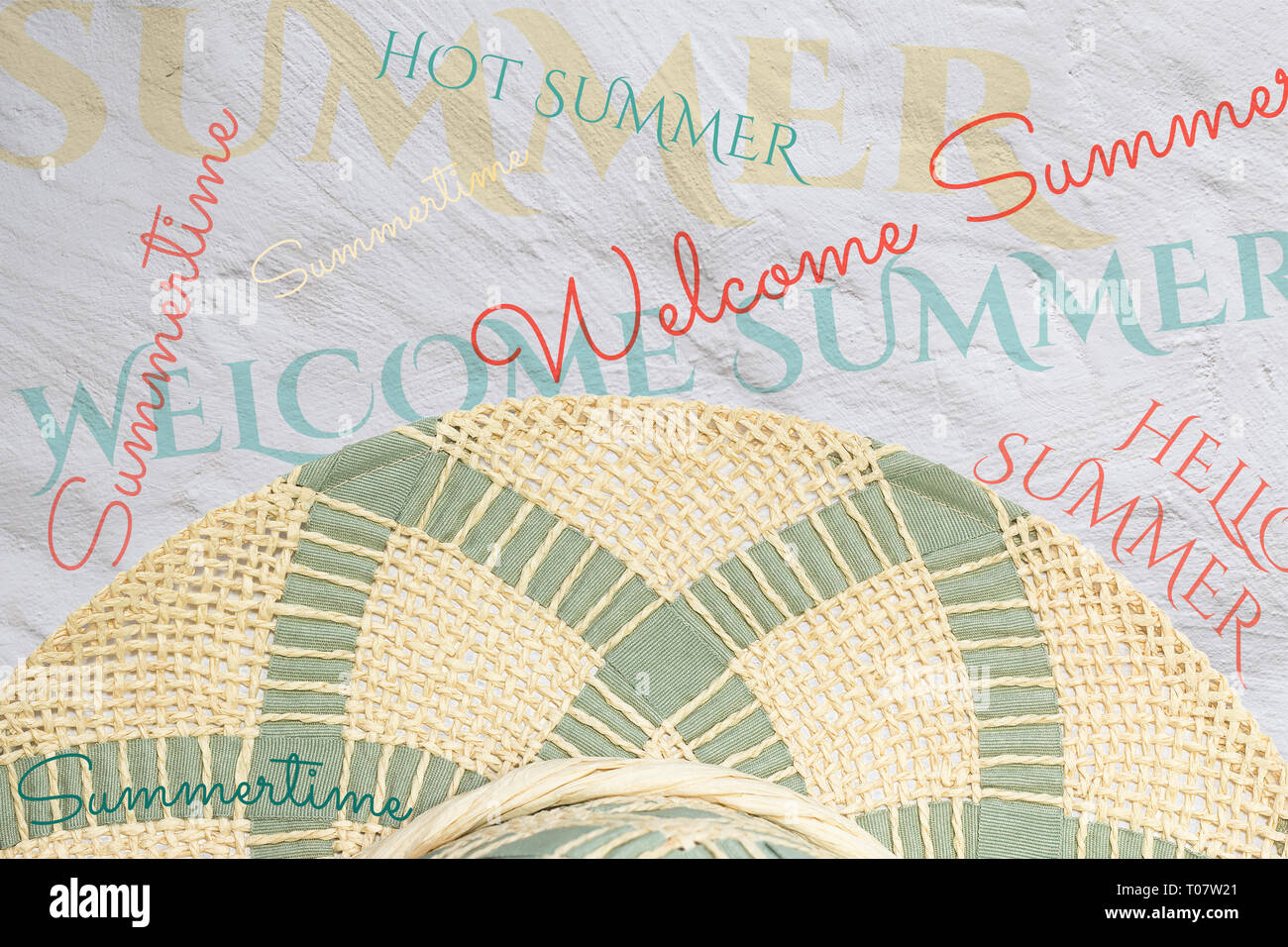 Summer concept. Straw hat on white limed background and various summer inscriptions Welcome summer, summertime, hello summer Stock Photo