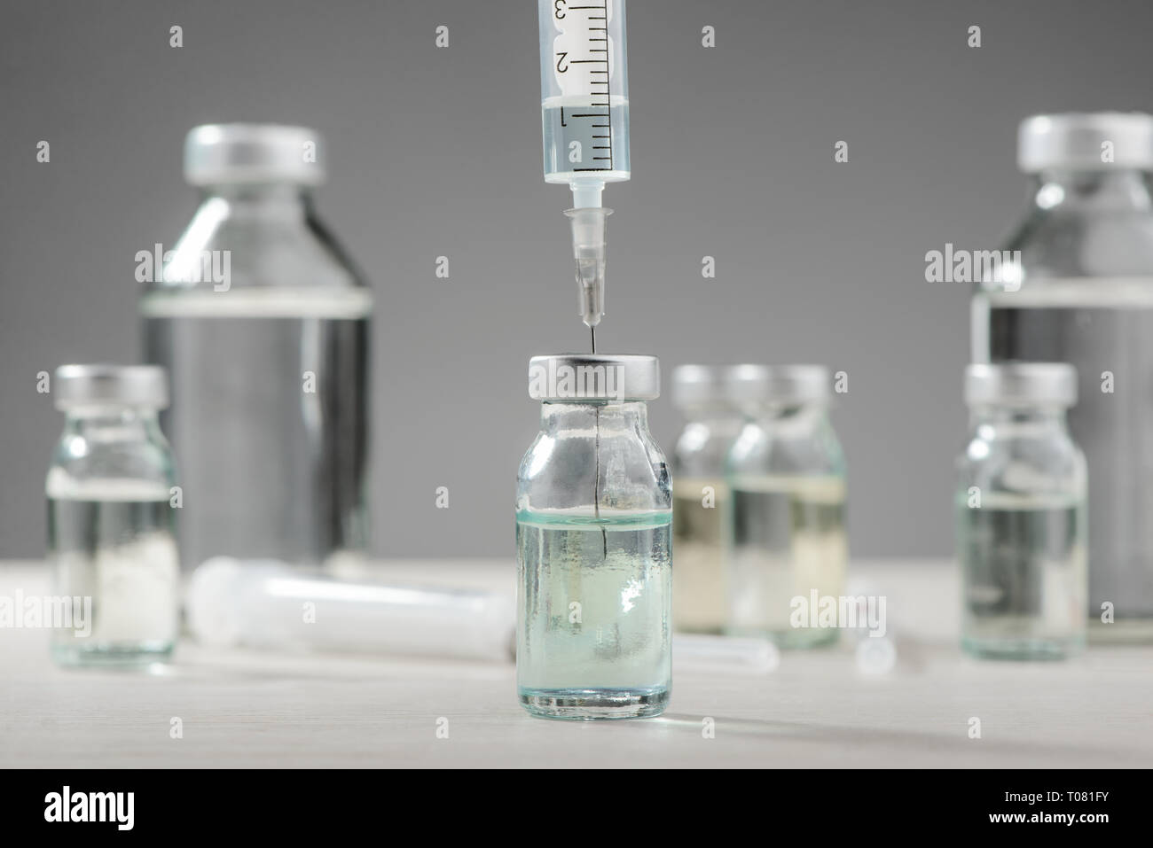 Drawing medication out of vial Stock Photo Alamy
