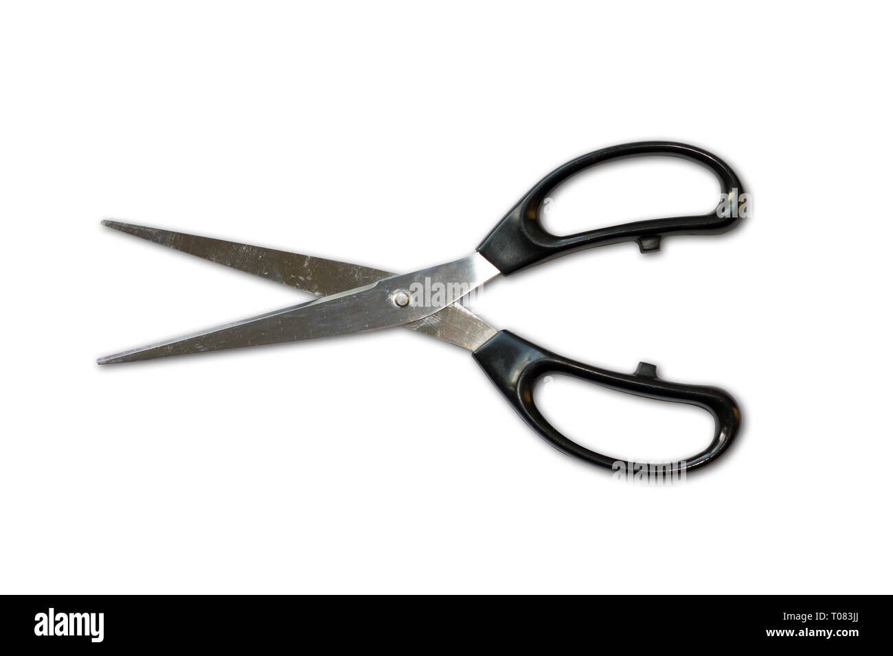 Scissors with a black handle in an open position Stock Photo