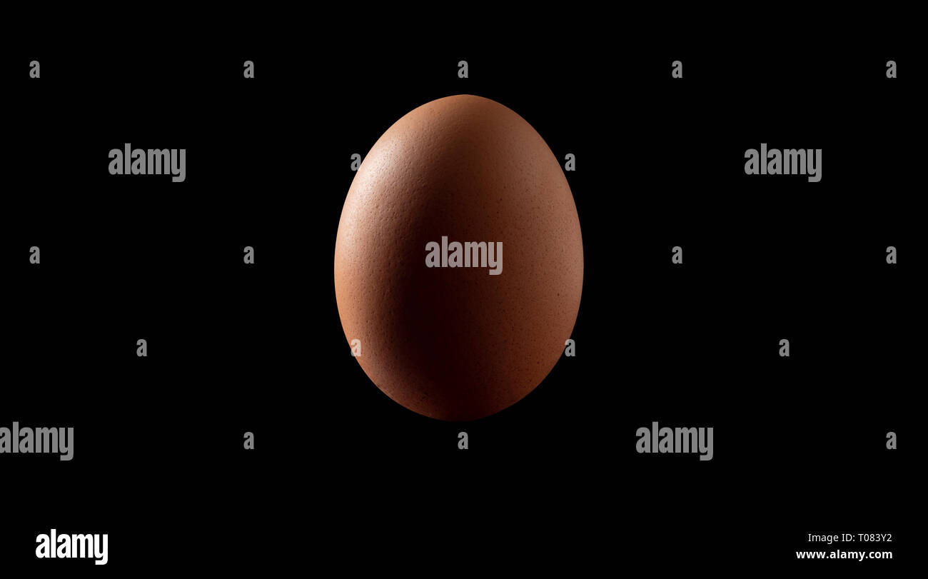 Single vertical chicken egg cut out Stock Photo