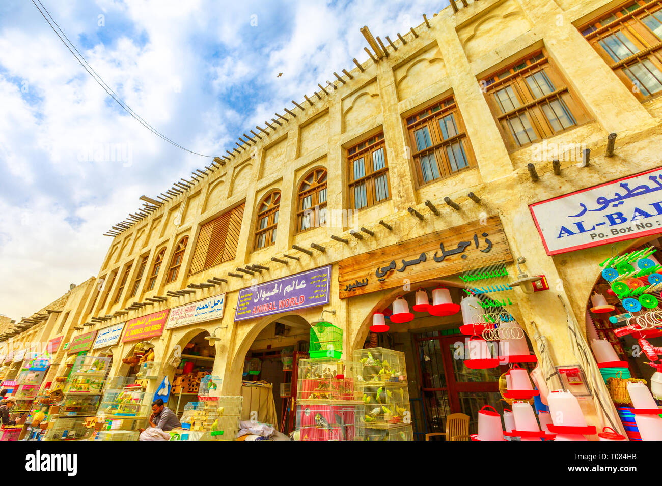 Doha, Qatar - February 19, 2019: bottom view of pet shop along pedestrian road inside Bird Souq, the animal market and popular tourist attraction in Stock Photo