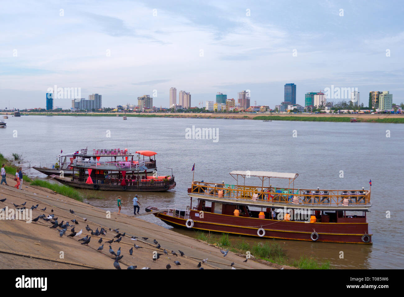 Sightseeing river tour boats, Phnom Penh, Cambodia, Asia Stock Photo