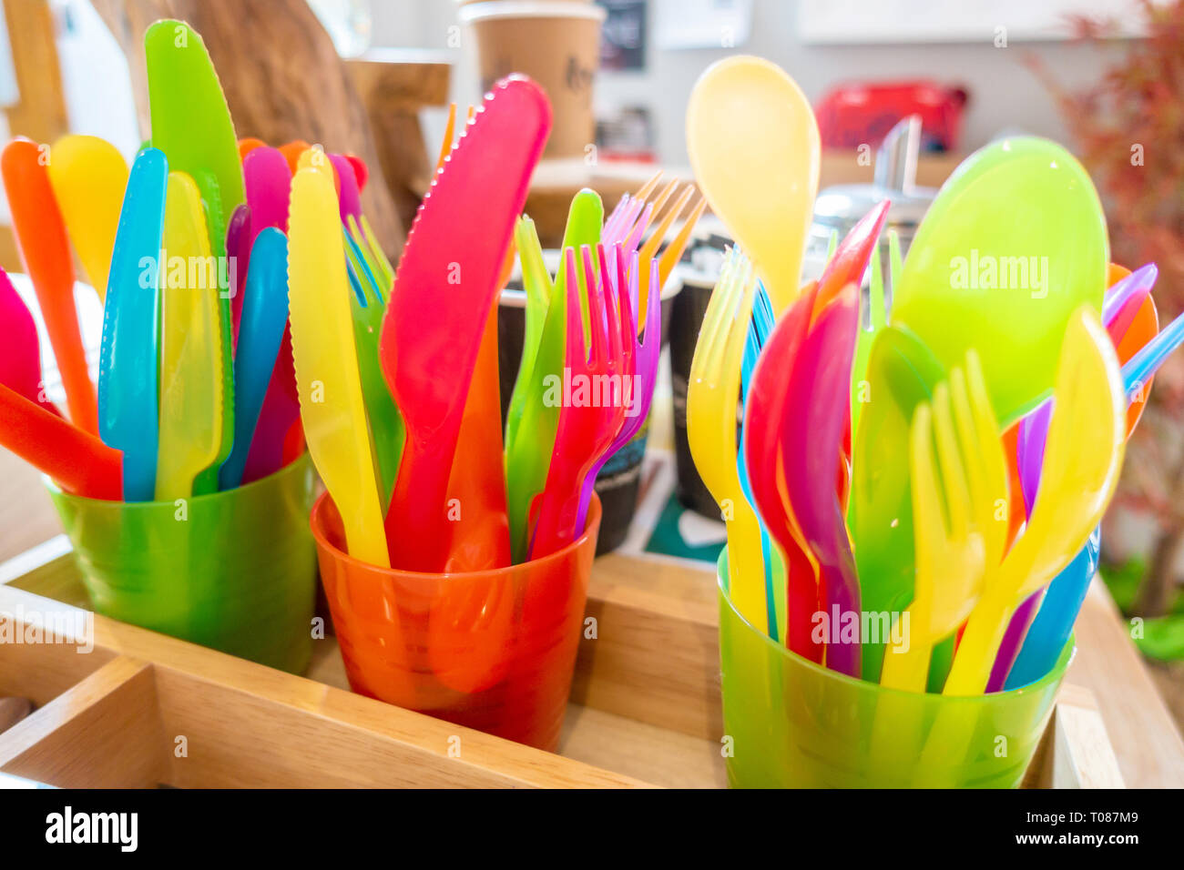 Colourful child safe plastic cutlery Stock Photo