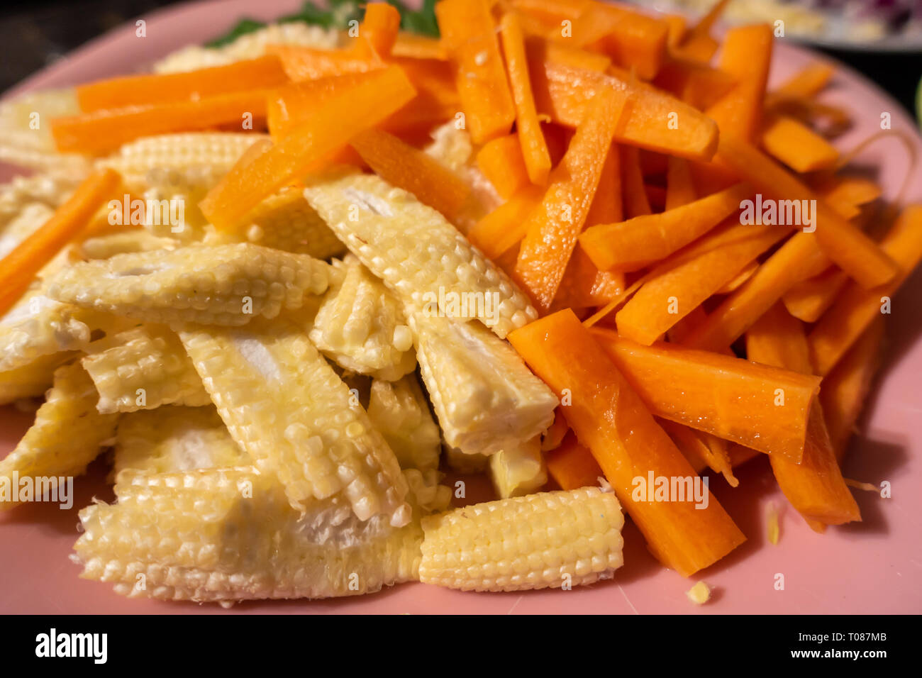 Chopped vegetables on a plate ready to cook Stock Photo