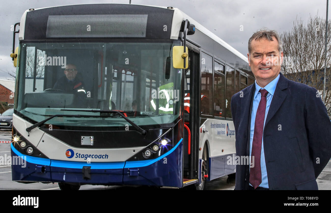 Stagecoach Group Chief Executive Martin Griffiths with the 'driverless' bus at the Stagecoach depot in Sharston, Manchester. Stock Photo