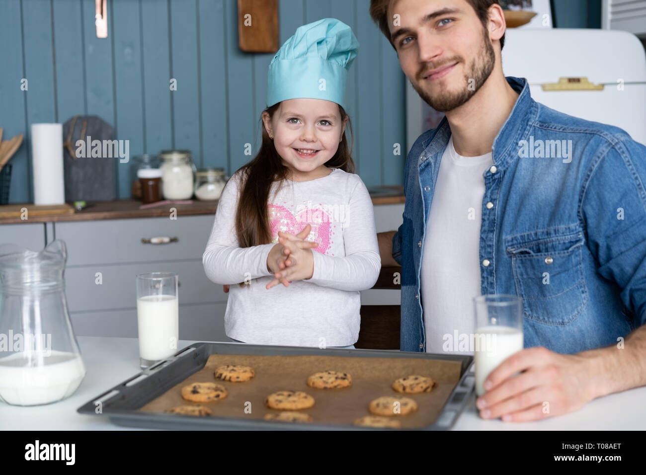 Concentrated girl baking in hi-res stock photography and images - Alamy