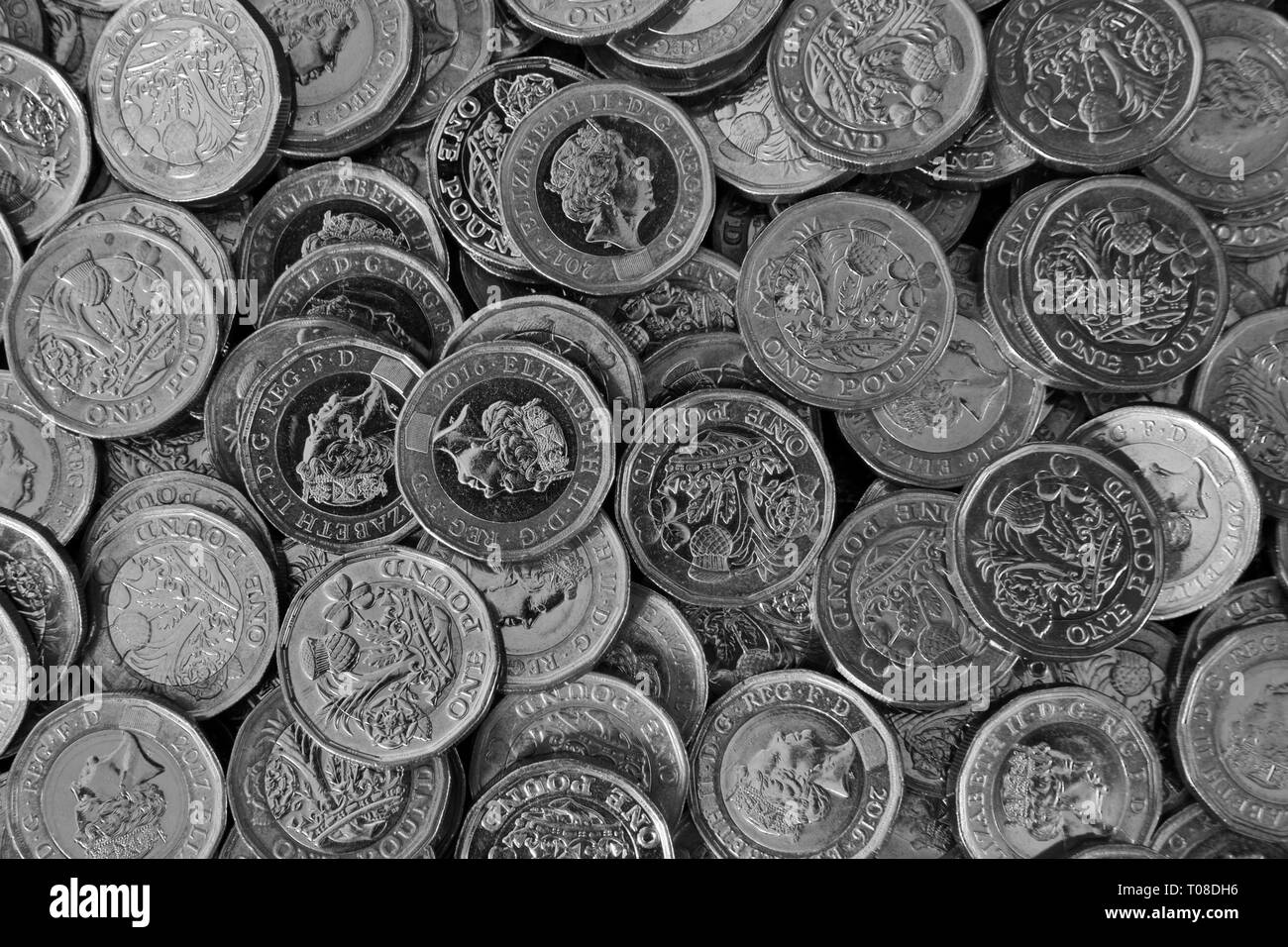 Pile of new UK One Pound Coins Stock Photo