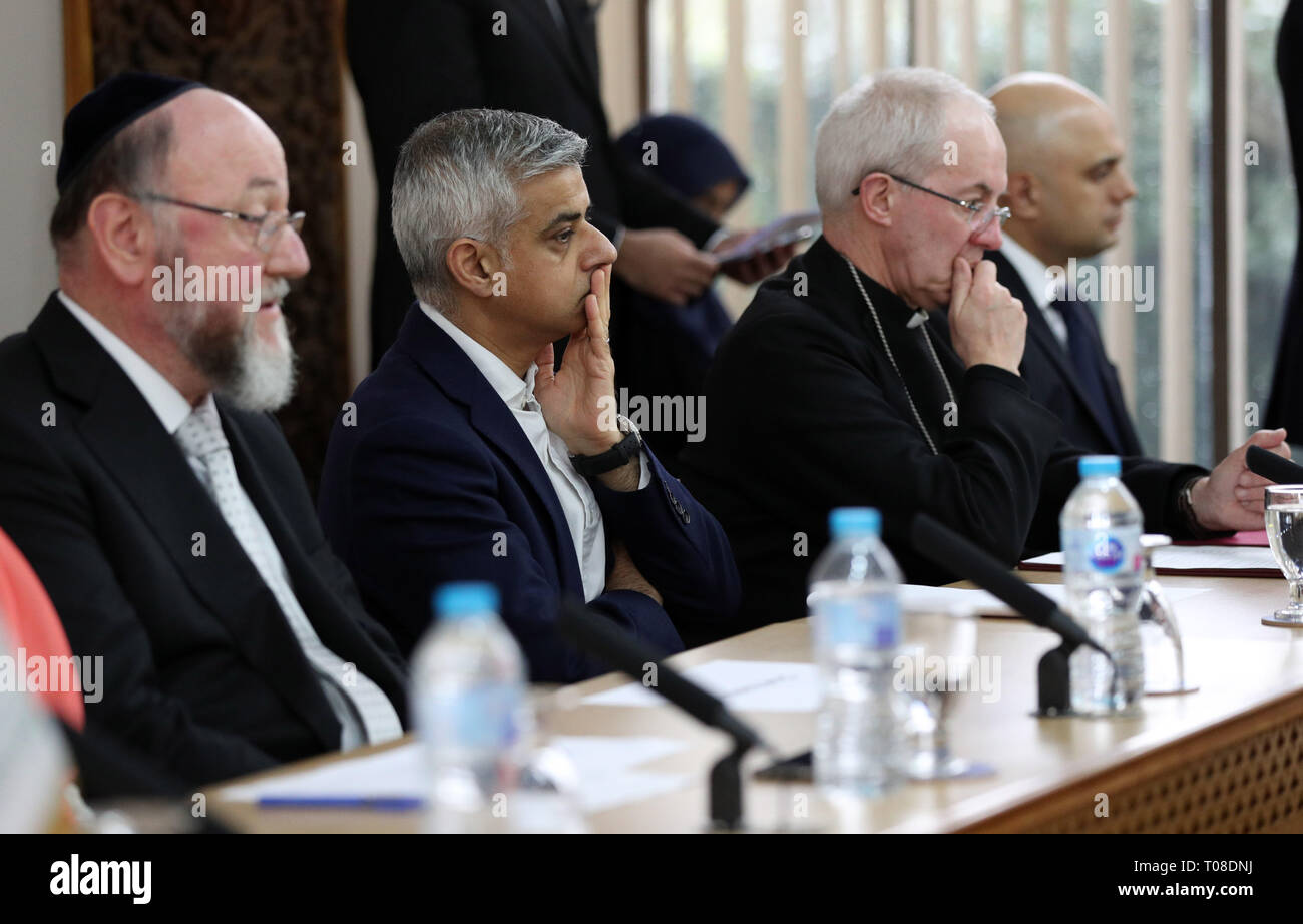 (Left to right) Chief Rabbi Ephraim Mirvis, Mayor of London, Sadiq Khan, Archbishop of Canterbury, Justin Welby, and the Home Secretary, Sajid Javid attend an Acting in Solidarity event held at Regents Park Mosque in north London, following Friday's attack on two mosques in Christchurch, New Zealand which killed 50 people. Stock Photo