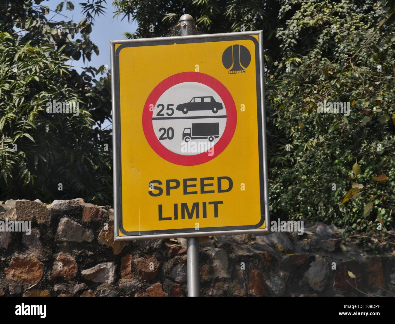 NEW DELHI, INDIAMARCH 2018 Speed limit sign for trucks and small cars by the side of a street