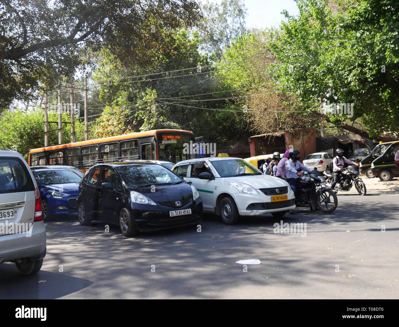 NEW DELHI, INDIA—MARCH 2018 Vehicles stop for a traffic light at an