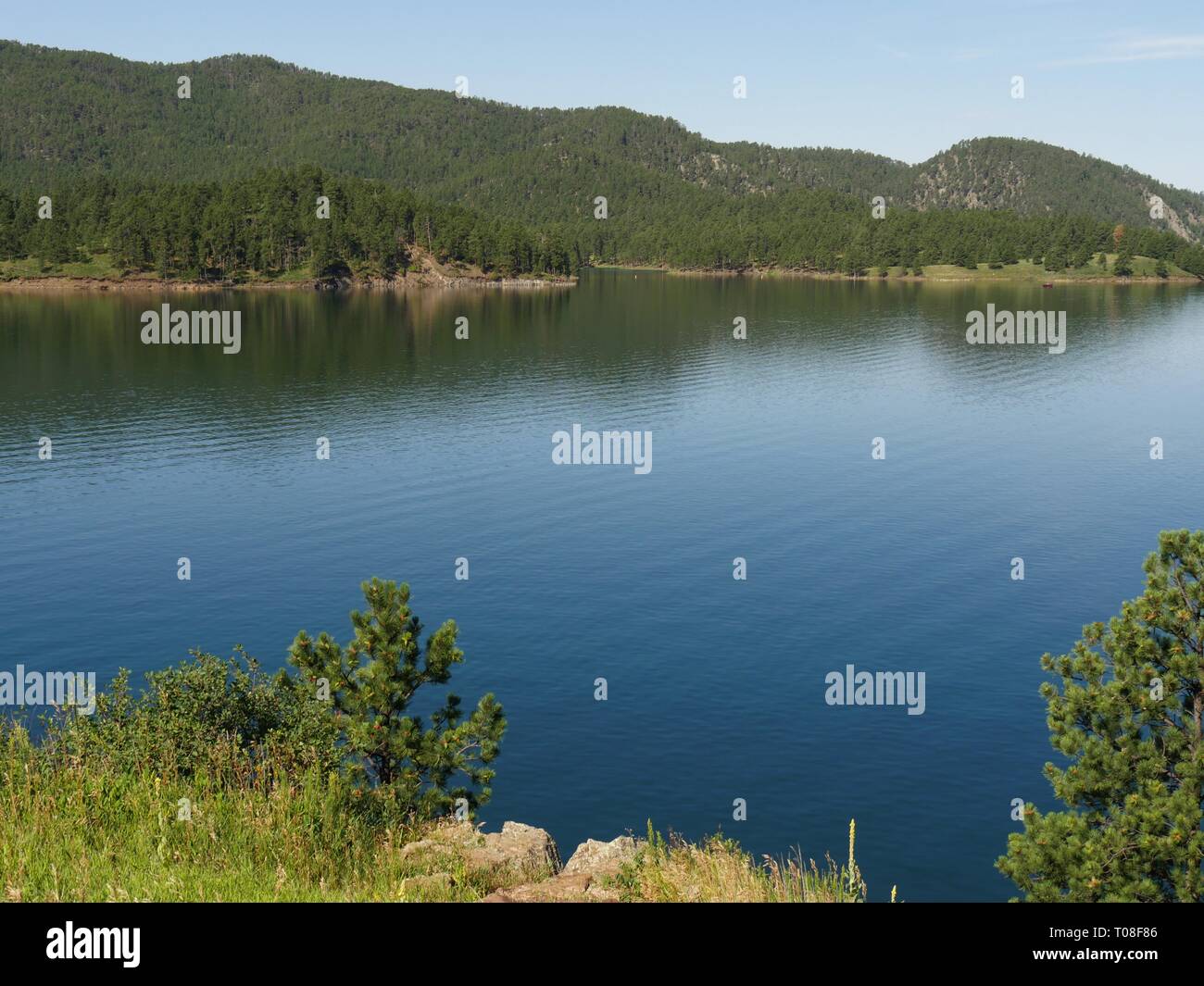Medium close up of Lake Pactola with its clear blue waters at Black