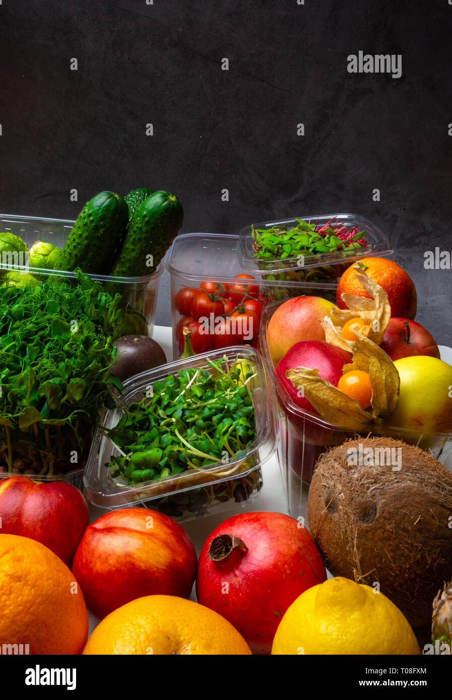 Colorful fruits and vegetables background, rich in vitamins and