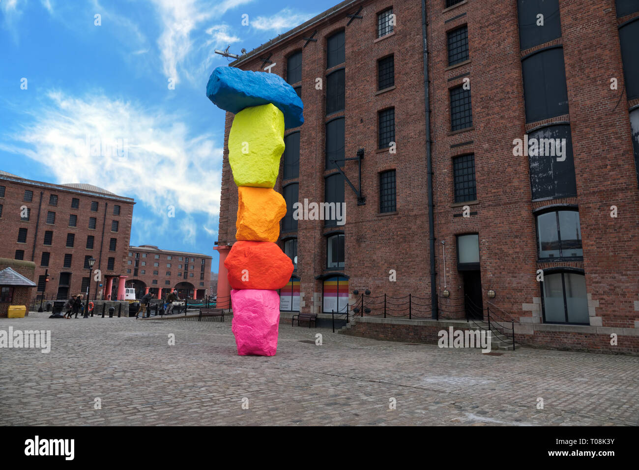 'Liverpool Mountain' by Swiss artist Ugo Rondinone’s 10-metre high sculpture stands in Mermaid Courtyard at Liverpool's Royal Albert Dock. Stock Photo