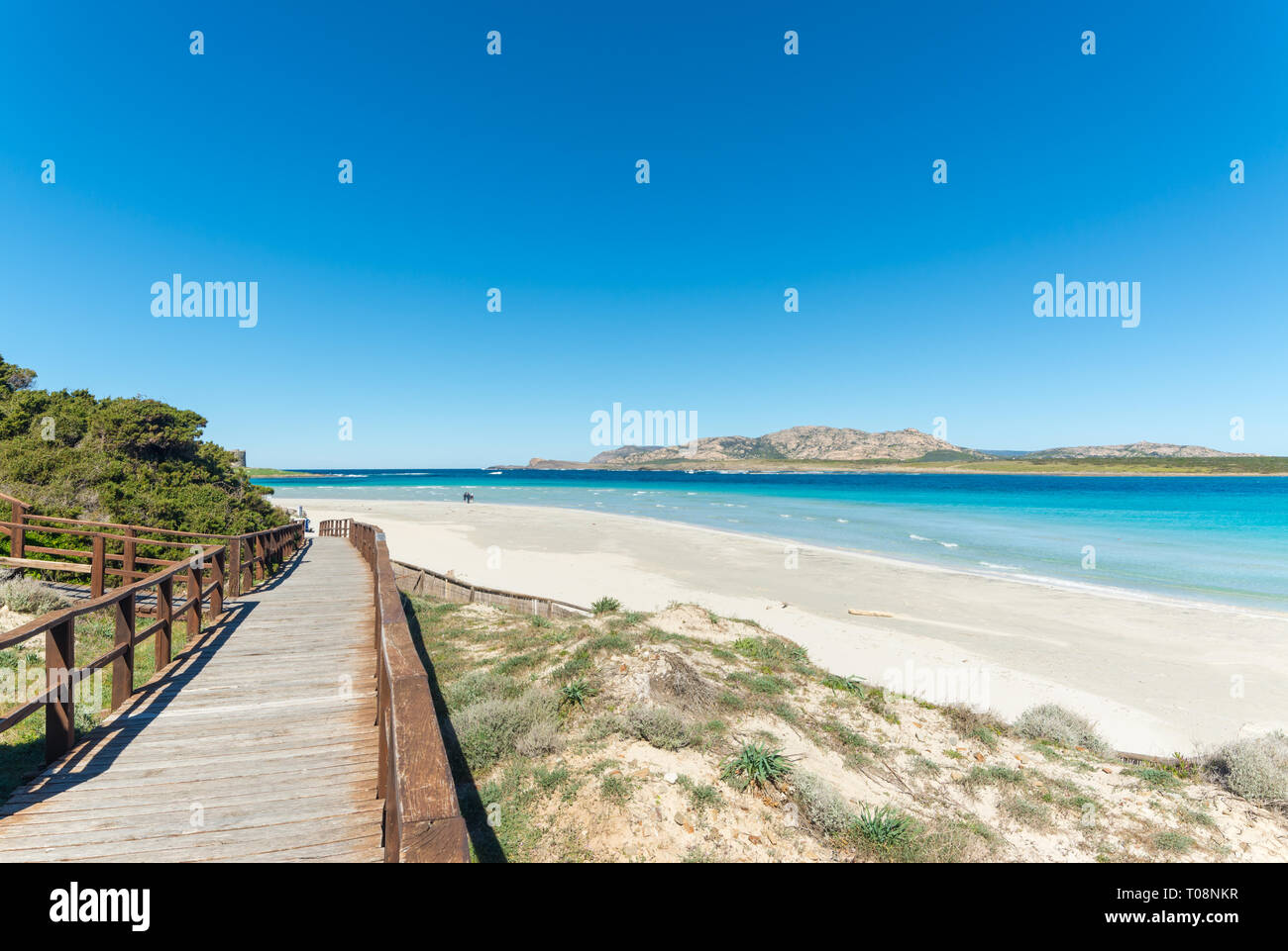 landscape of empty La Pelosa beach in a sunny day, with its white sand and clear water Stock Photo
