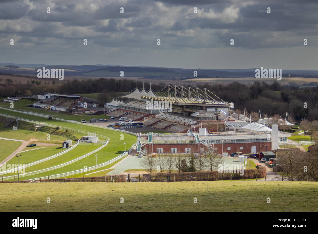 Views towards Goodwood Estate Racecourse taken from The Trundle (St Roche's Hill) in the South Downs National Park near Chichester, West Sussex, UK Stock Photo