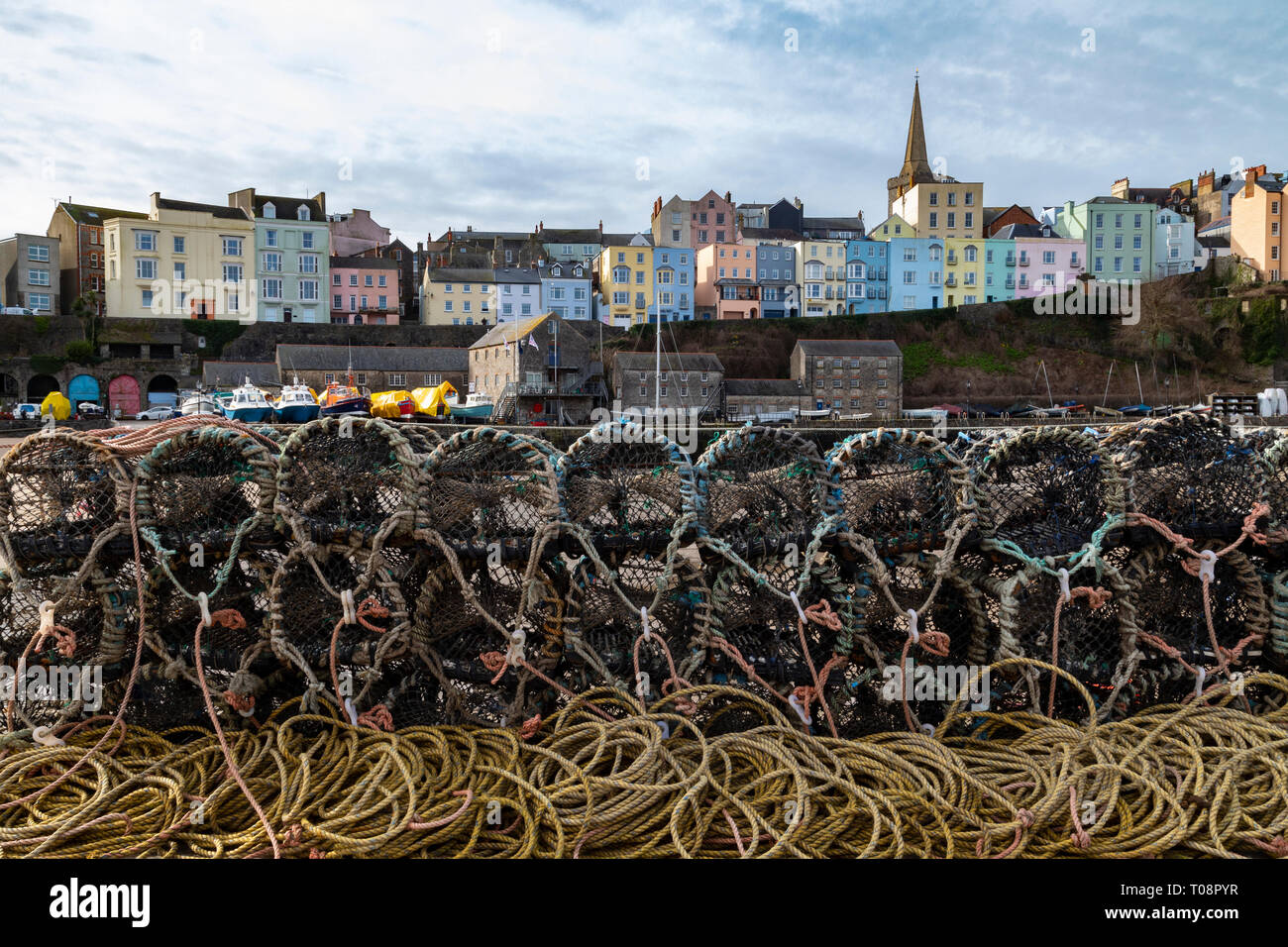 Tenby harbor in Carmarthen Bay - Tenby in Pembrokeshire on the south coast of Wales in the United Kingdom. Stock Photo
