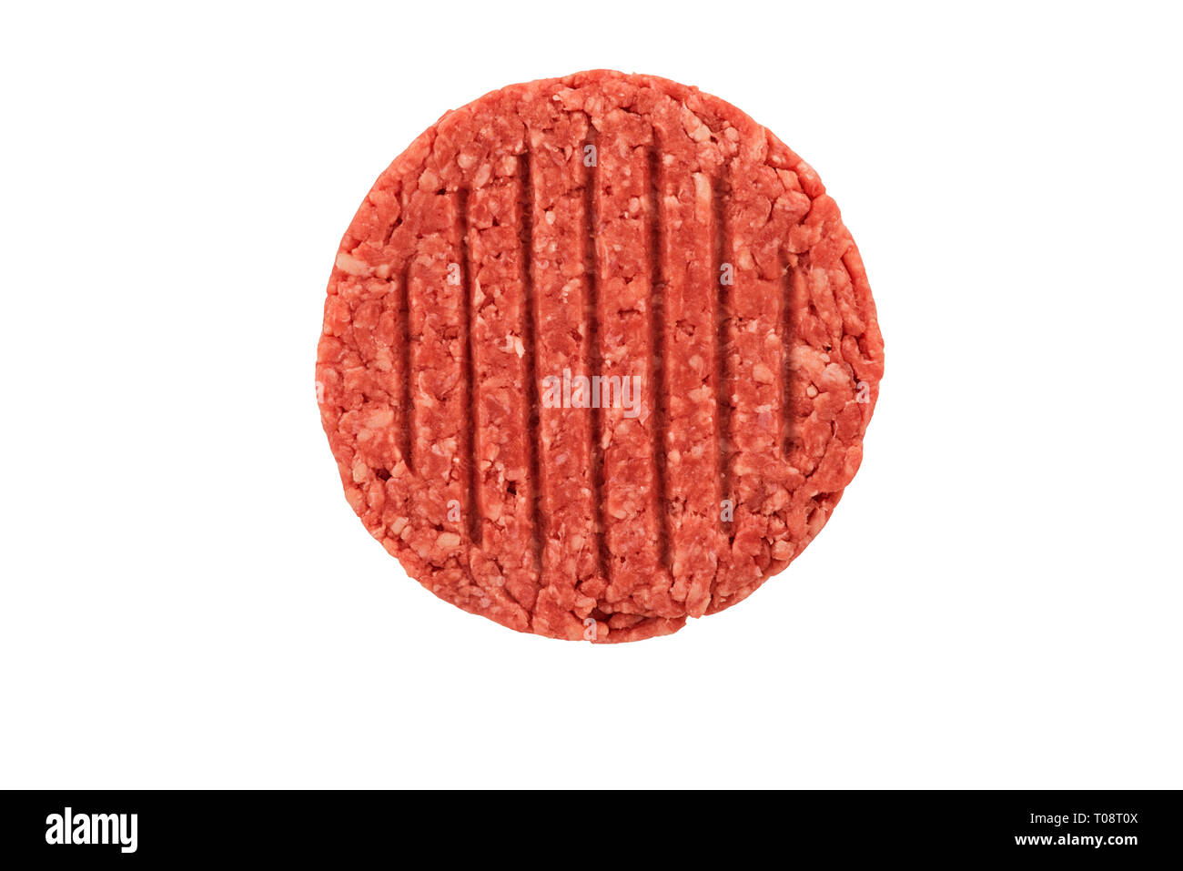 Close up on a raw ground beef burger steak patty isolated on white