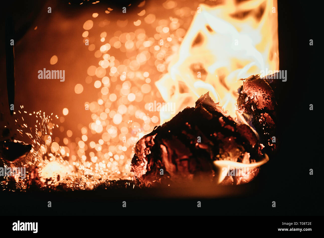 Blaze fire flame in oven, orange and black Stock Photo Alamy