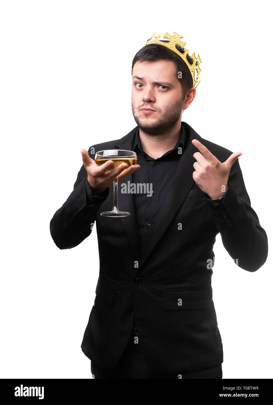 Brunet in crown, black suit with wine glass in hand. Stock Photo