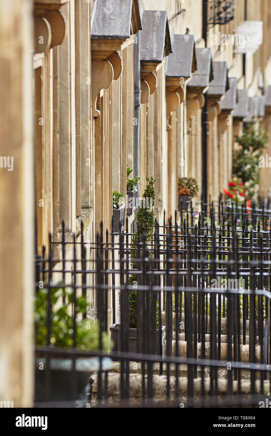 The facades of historic stone town houses in Bath, Somerset, Great Britain. Stock Photo