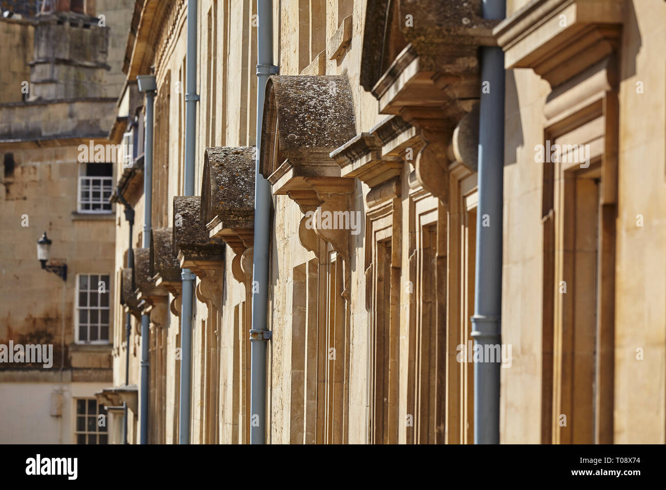 The facades of historic stone town houses in Bath, Somerset, Great Britain. Stock Photo