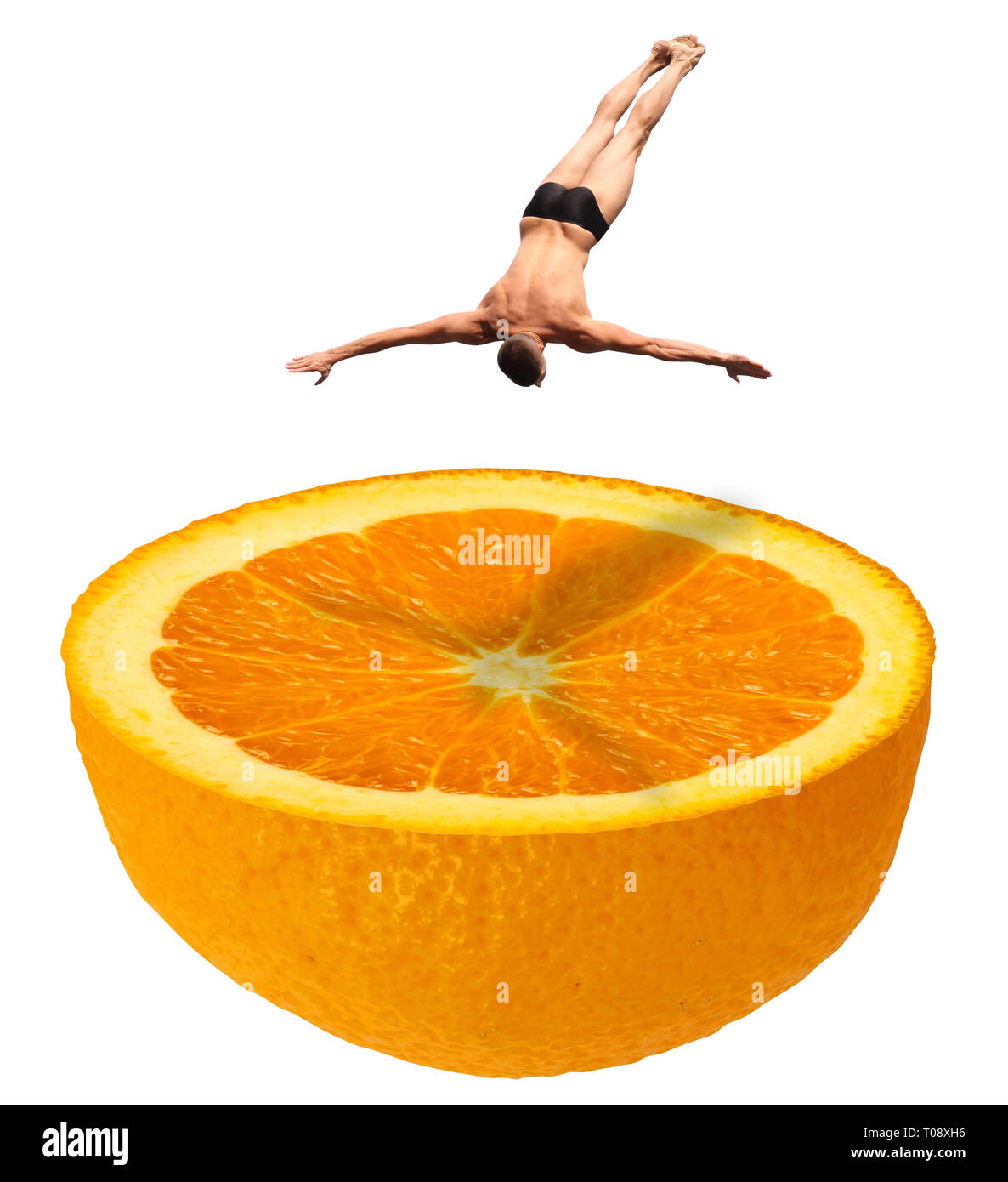 High diving swimmer in swim suit briefs jumping down in a half fresh juicy orange fruit like a swimming pool - manipulated photo concept image - isola Stock Photo