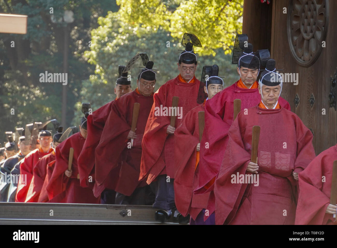 Priests in a procession at Meiji Shrine located in Shibuya, Tokyo, Ceremony to commemorate Emperor Meiji's birthday on November 3rd Stock Photo