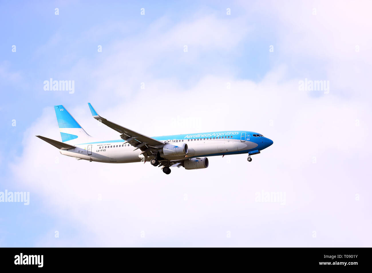Buenos Aires, Argentina - March 18, 2019: Aerolineas Argentinas plane flying over Buenos Aires in Capital Federal, Buenos Aires, Argentina Stock Photo