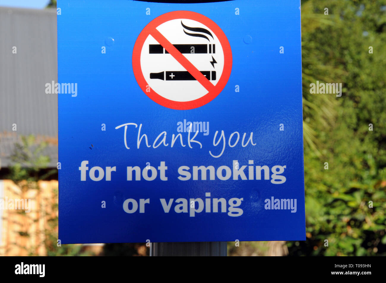 A no smaoking or vaping sign in the town of Hamner Springs, a resort area in the Canterbury region of New Zealands South Island. Stock Photo