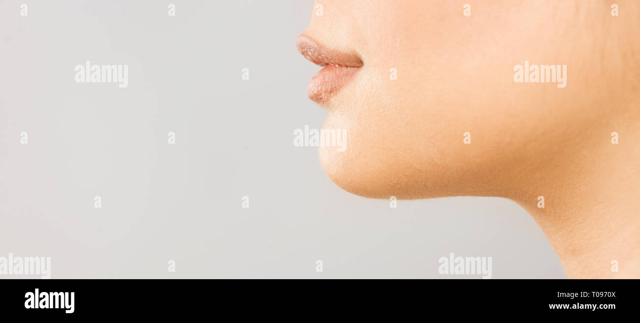 macro detail shot of human lips and smile Stock Photo