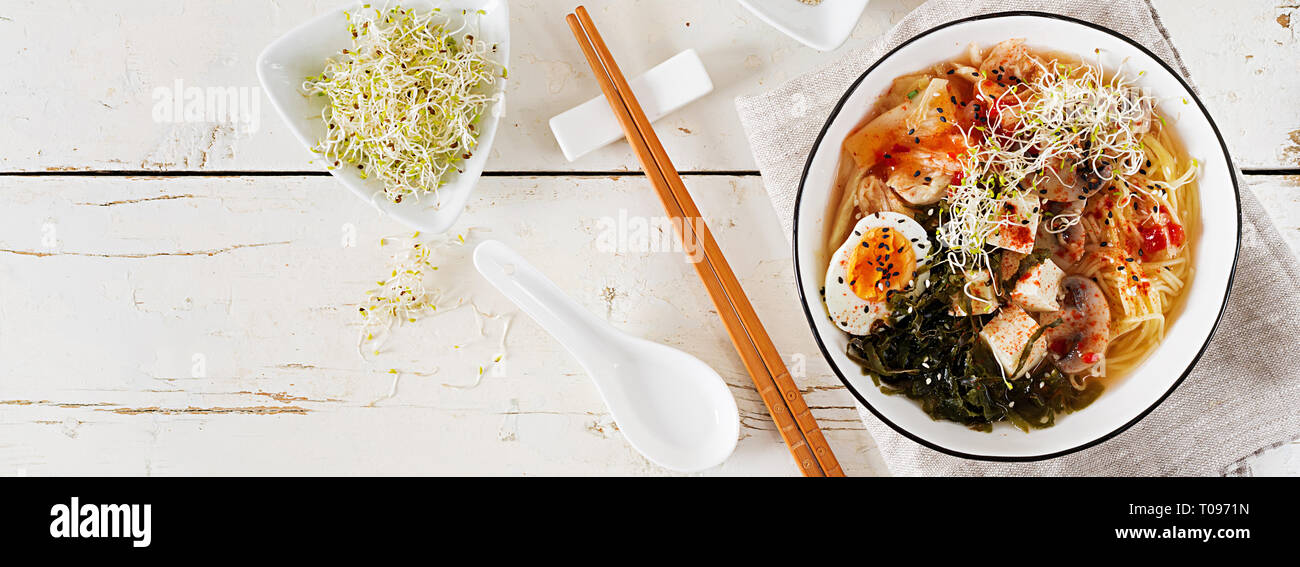 Miso Ramen Asian noodles with cabbage kimchi, seaweed, egg, mushrooms