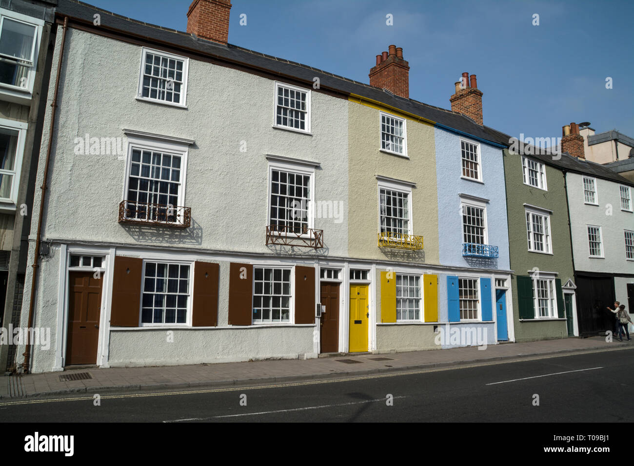 a row of colourful painted houses in Holywell street, Oxford, Oxfordshire, Britain Stock Photo