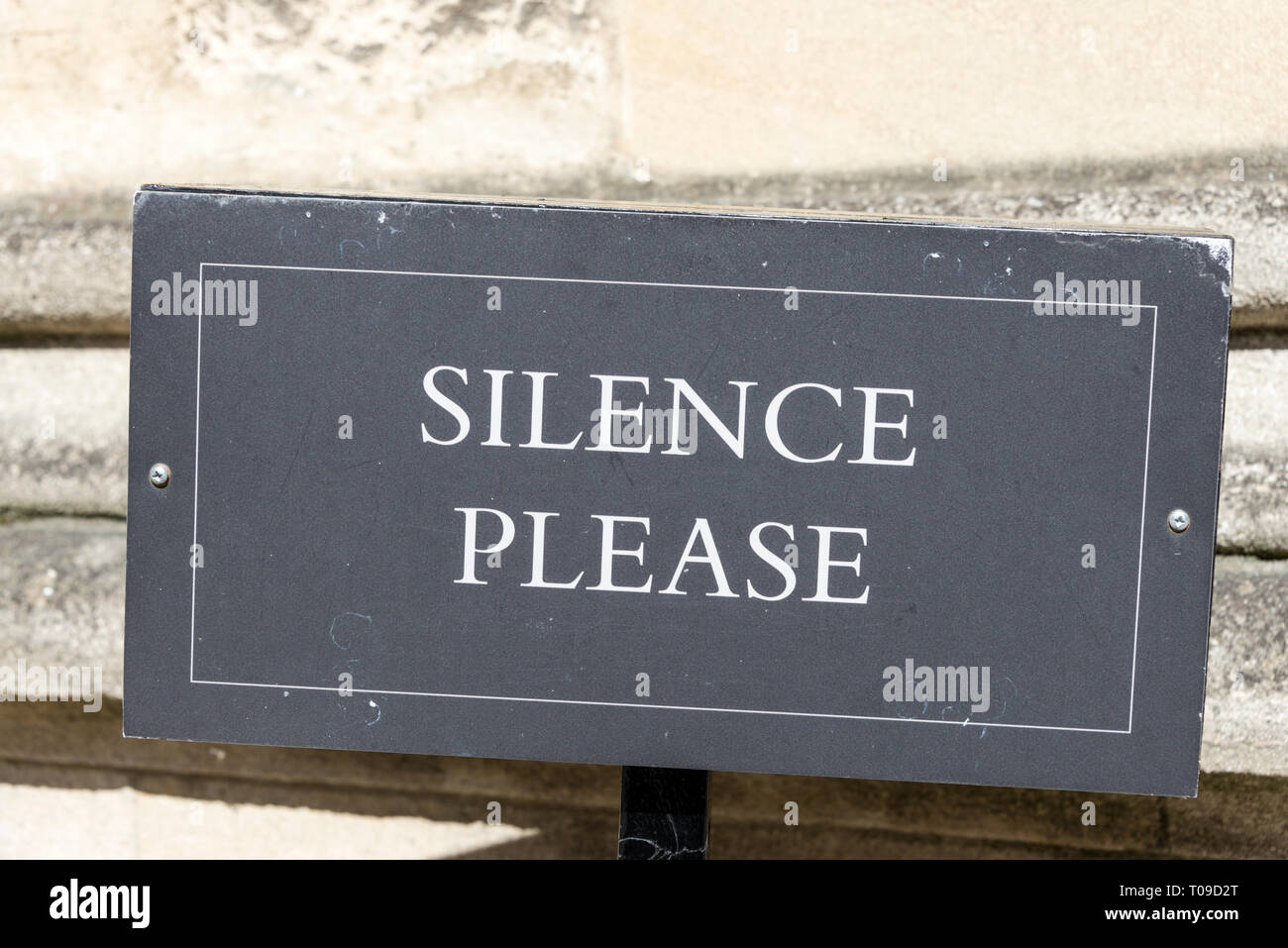 A sign often seen at colleges in Oxford whilst student sit their exams or a meeting is in progress, Oxford, Britain Stock Photo