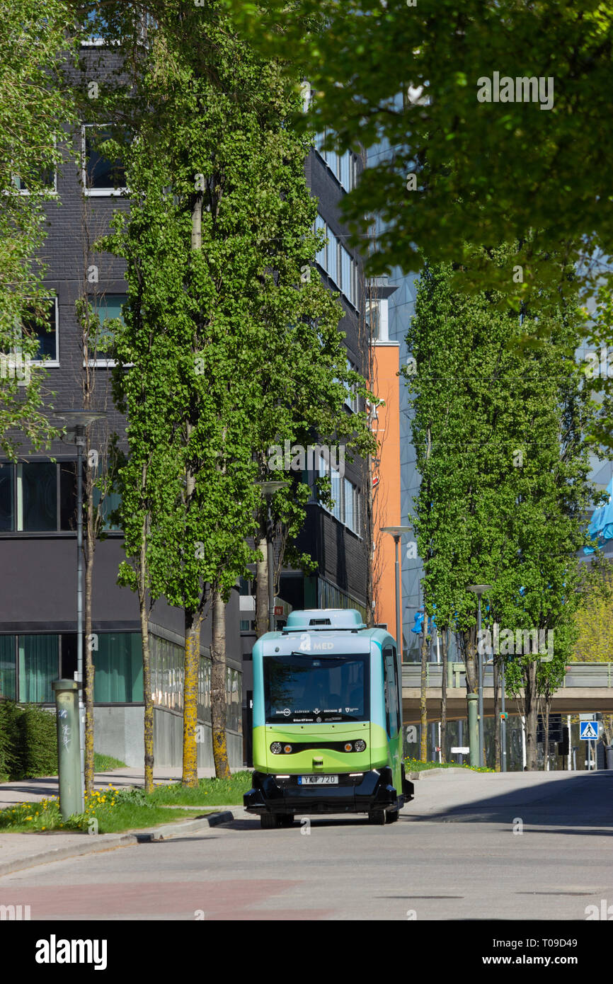 The 100% driverless electric vehicle mobility solution can operate on fixed or on-demand routes supervised by EasyMile’ software. En route in Kista. Stock Photo