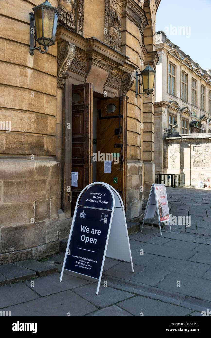 Main visitors entrance to the Sheldonian Theatre on Broad Street in Oxford, Oxfordshire, Britain.  The theatre is the official ceremonial hall of the  Stock Photo