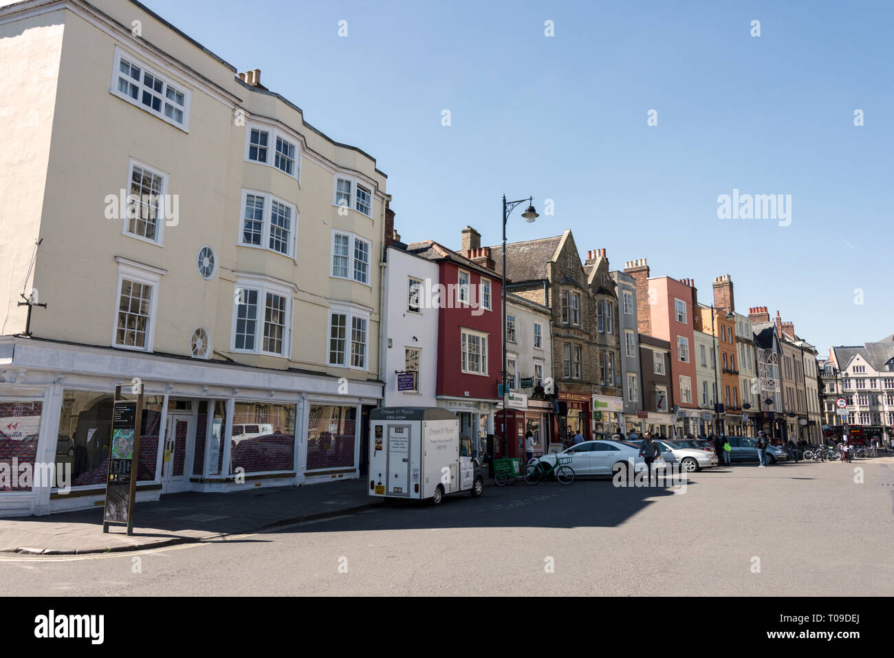 A row of shops and eateries on Broad Street  in Oxford, Oxfordshire,Britain Stock Photo