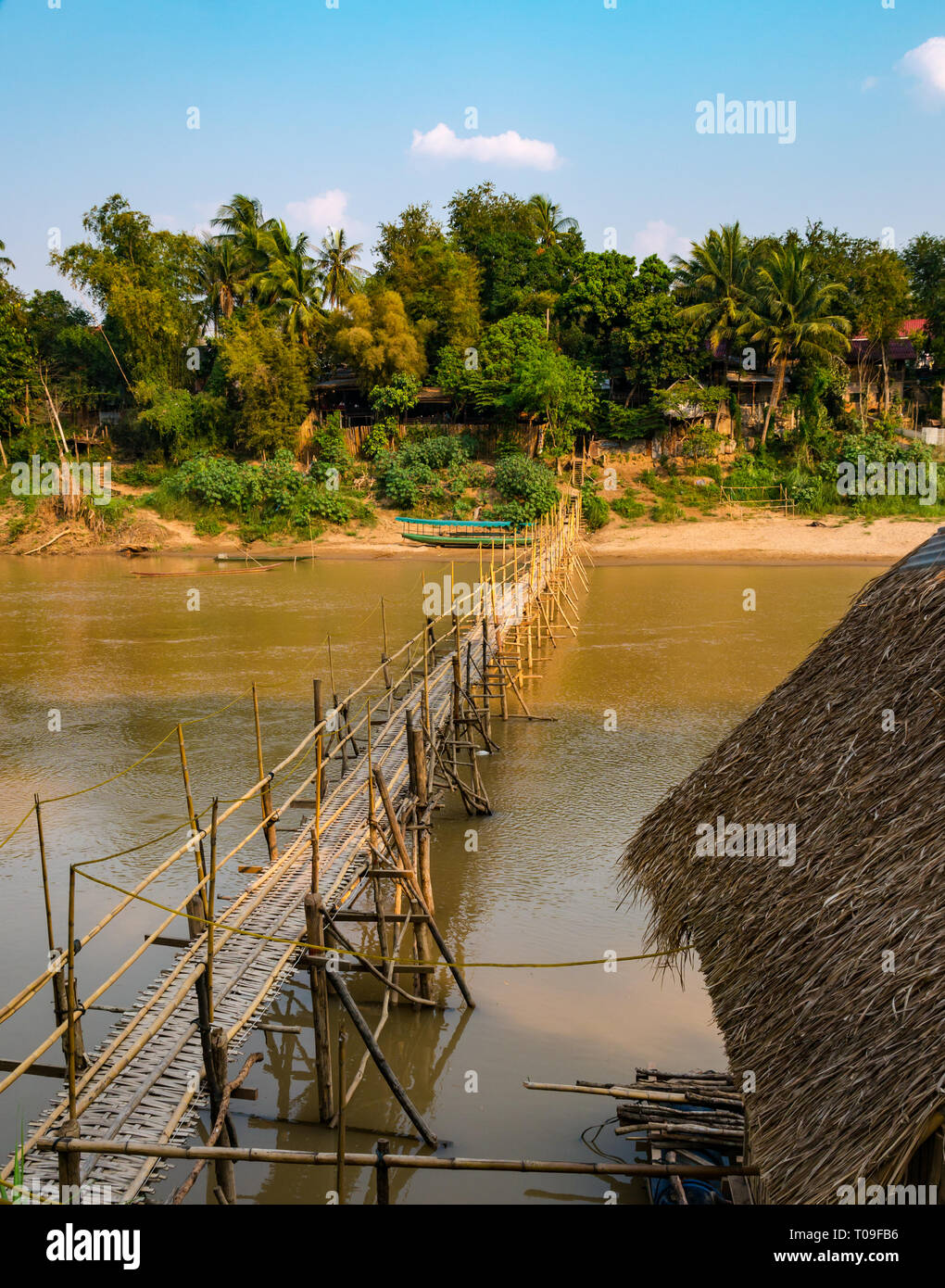 Bamboo cane bridge over Nam Kahn river tributary of Mekong, Luang Prabang, Laos, Indochina, SE Asia Stock Photo