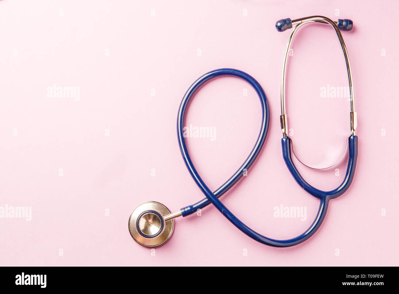Phonendoscope on empty pink background Stock Photo