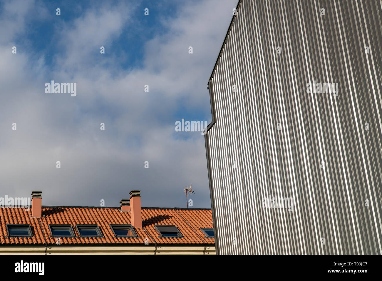 Building with metallic cladding. Construction elements of modern architecture Stock Photo
