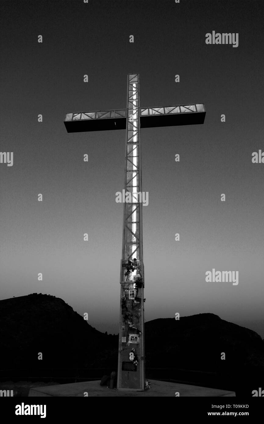 The memorial cross above Playa De Levante beach, Benidorm resort, Costa Blanca, Valencia Province, Spain, Europe. Stock Photo