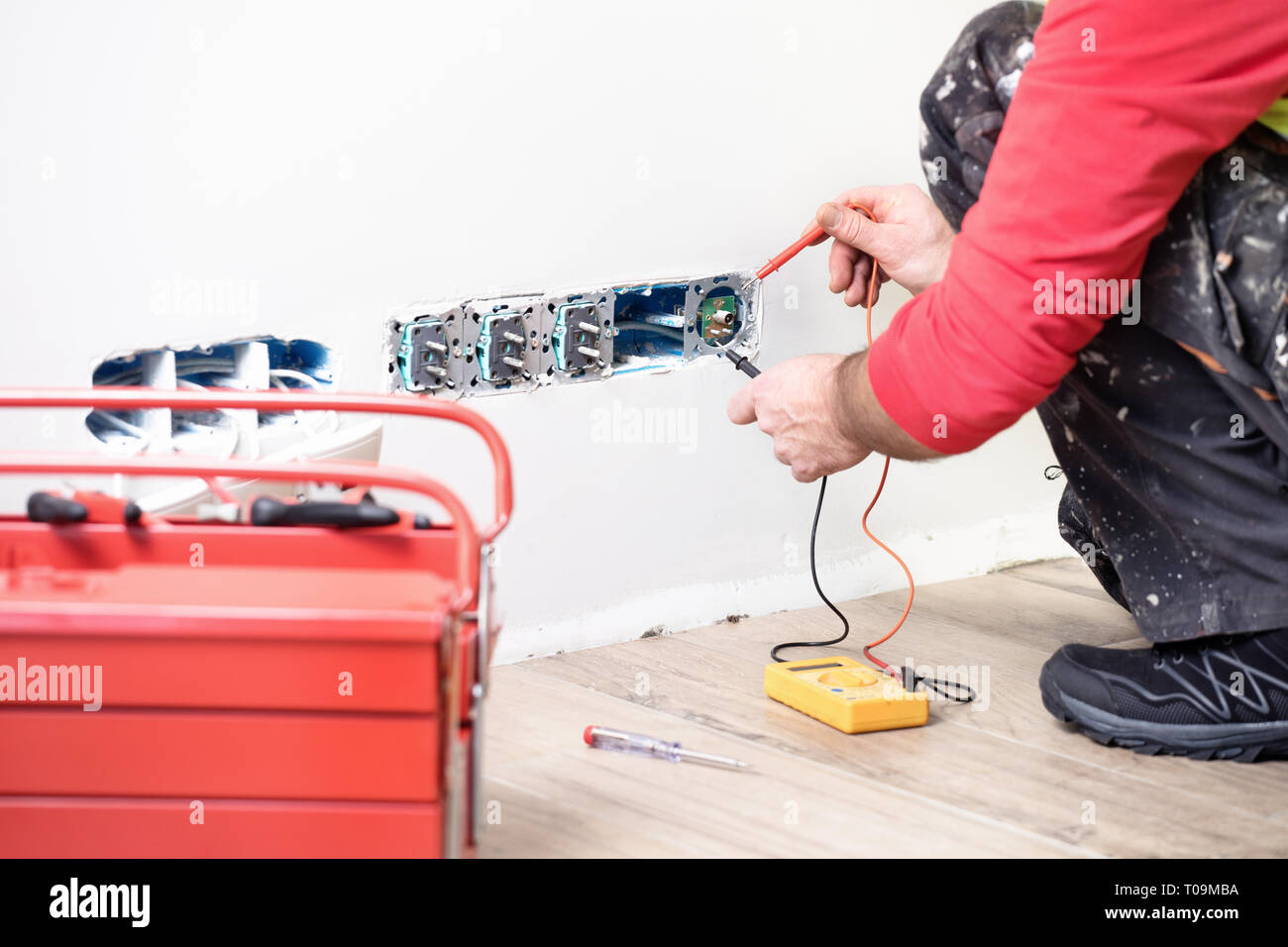 Electrician Hands Installing Wall Socket Stock Photo - Alamy